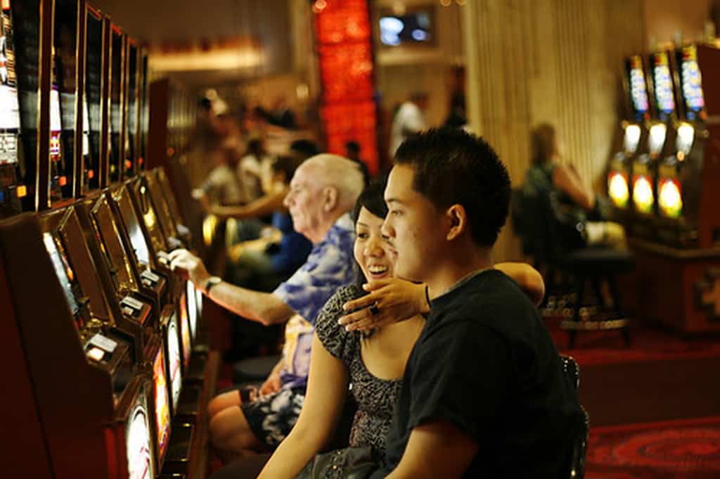 couple playing slots