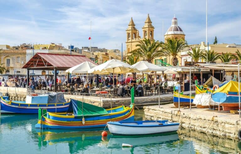 colorful boats at a marina in Malta