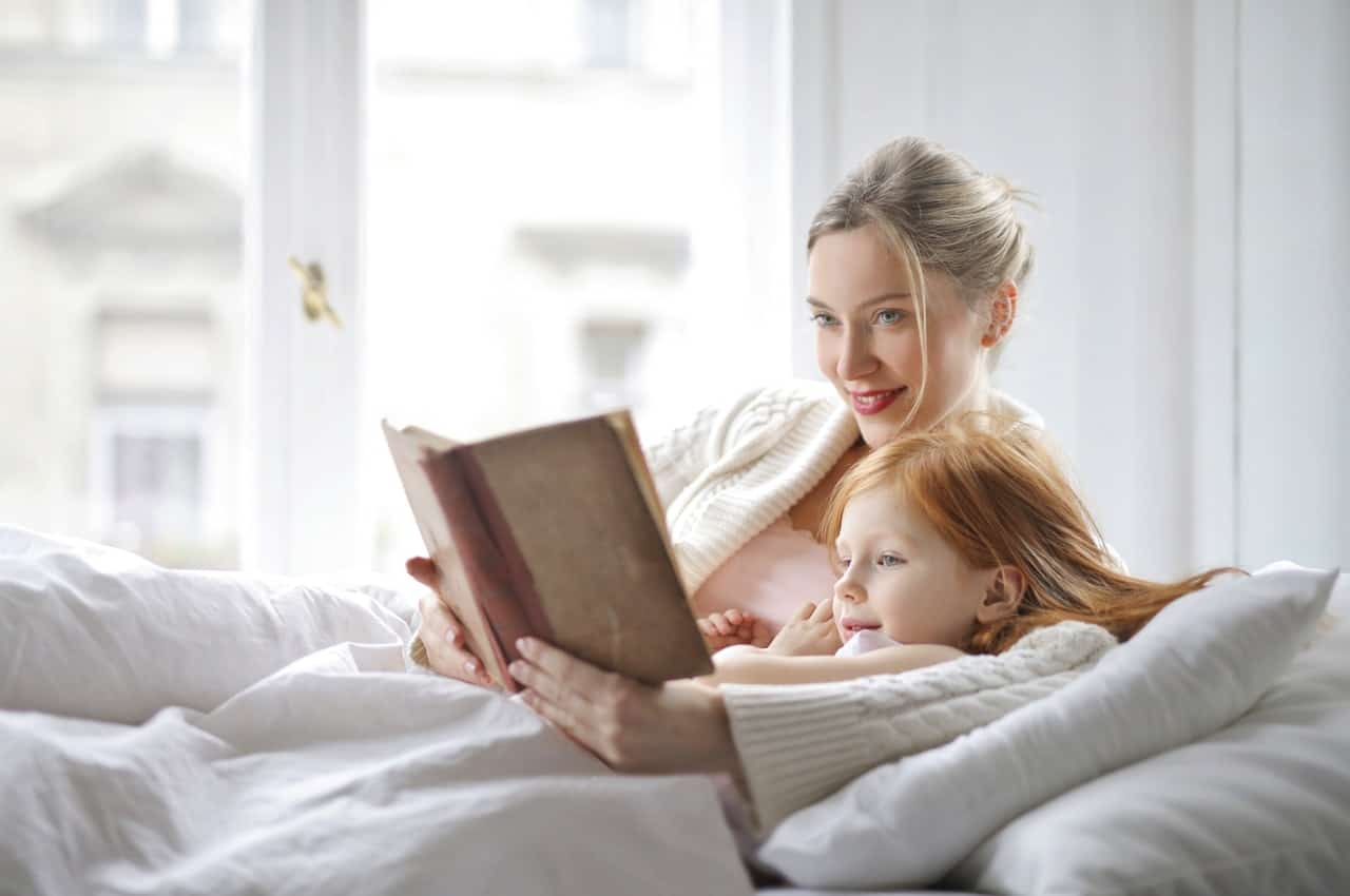 mom daughter reading