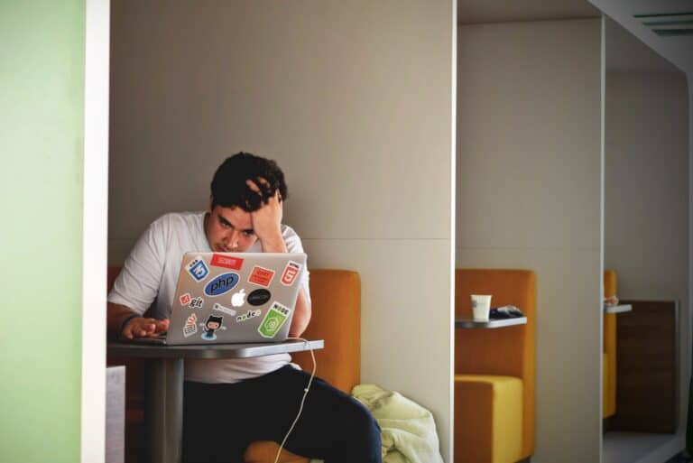 stressed man using computer