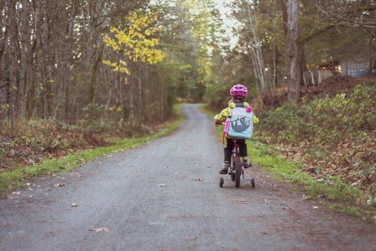 child on little bike