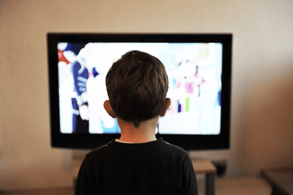 child near tv