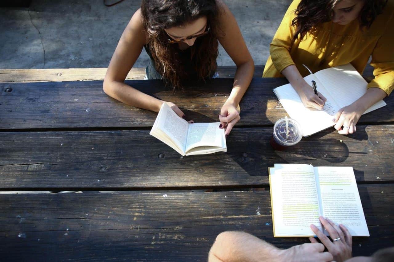 students reading books