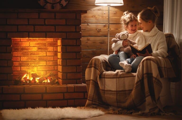 family near fireplace
