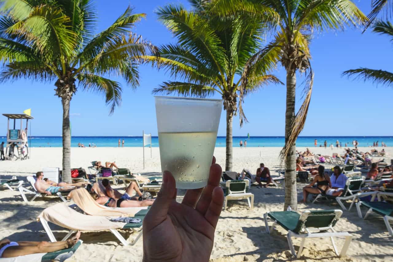 drinking on beach in