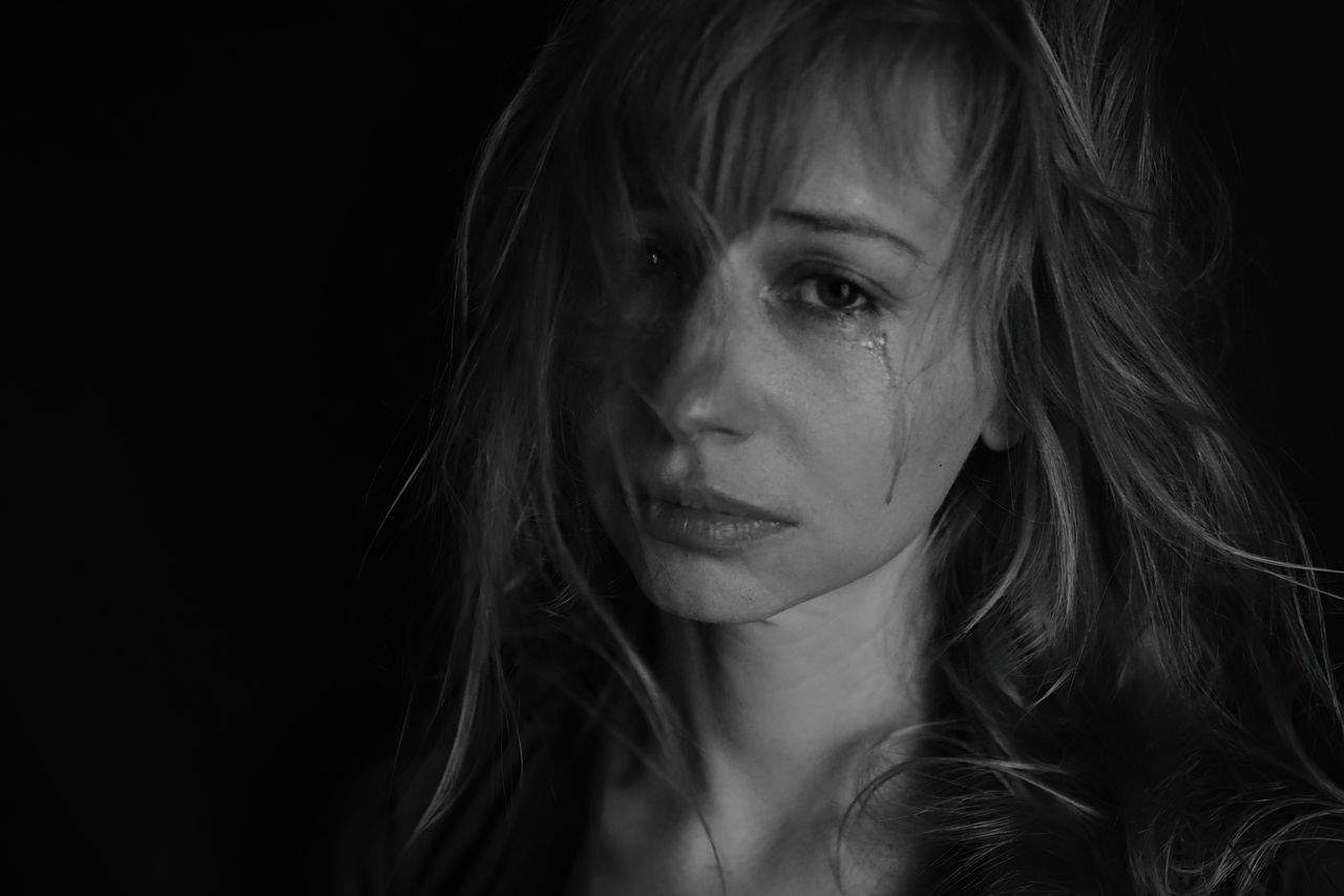 mom crying in bed