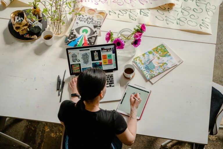 woman drawing on tablet