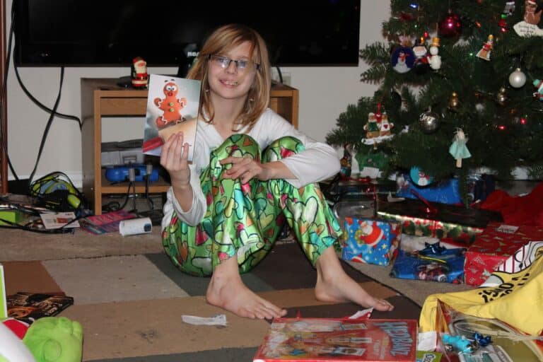 child opening crappy gifts