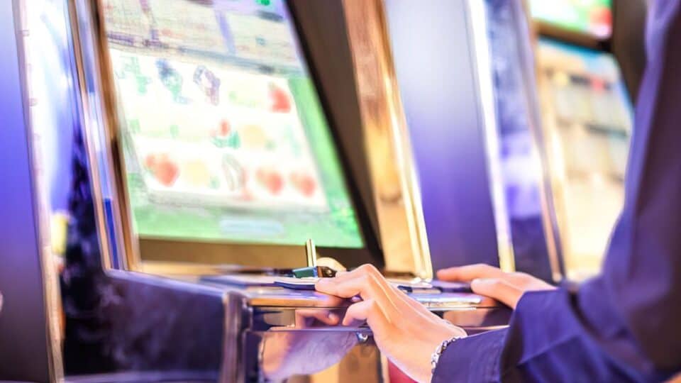 Stick With One Casino Or Change Clubs - Which One Is Better? 2 person playing on arcade machine