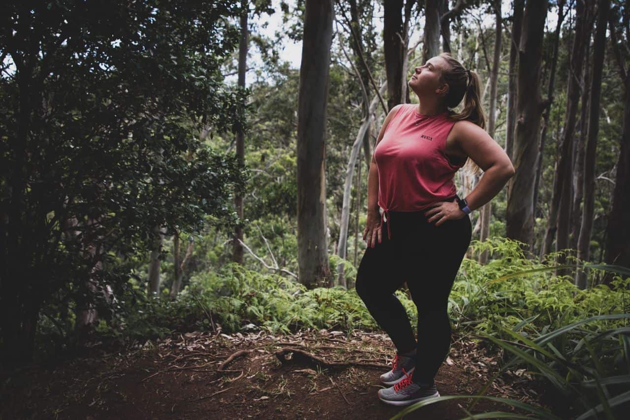 woman jogging in forest