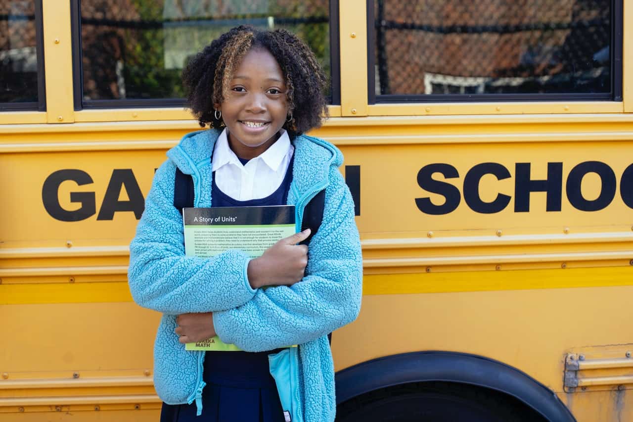 child waiting for the bus