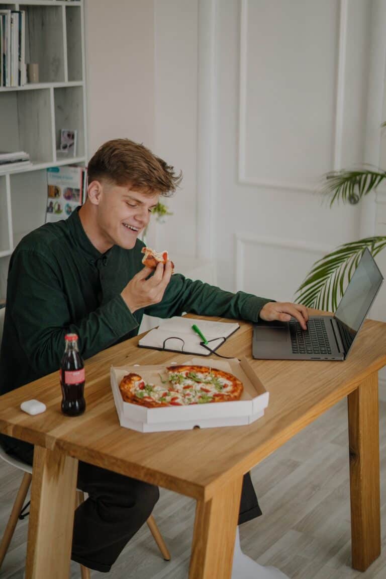 home office eating pizza