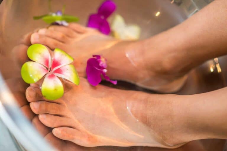 feet with a flower