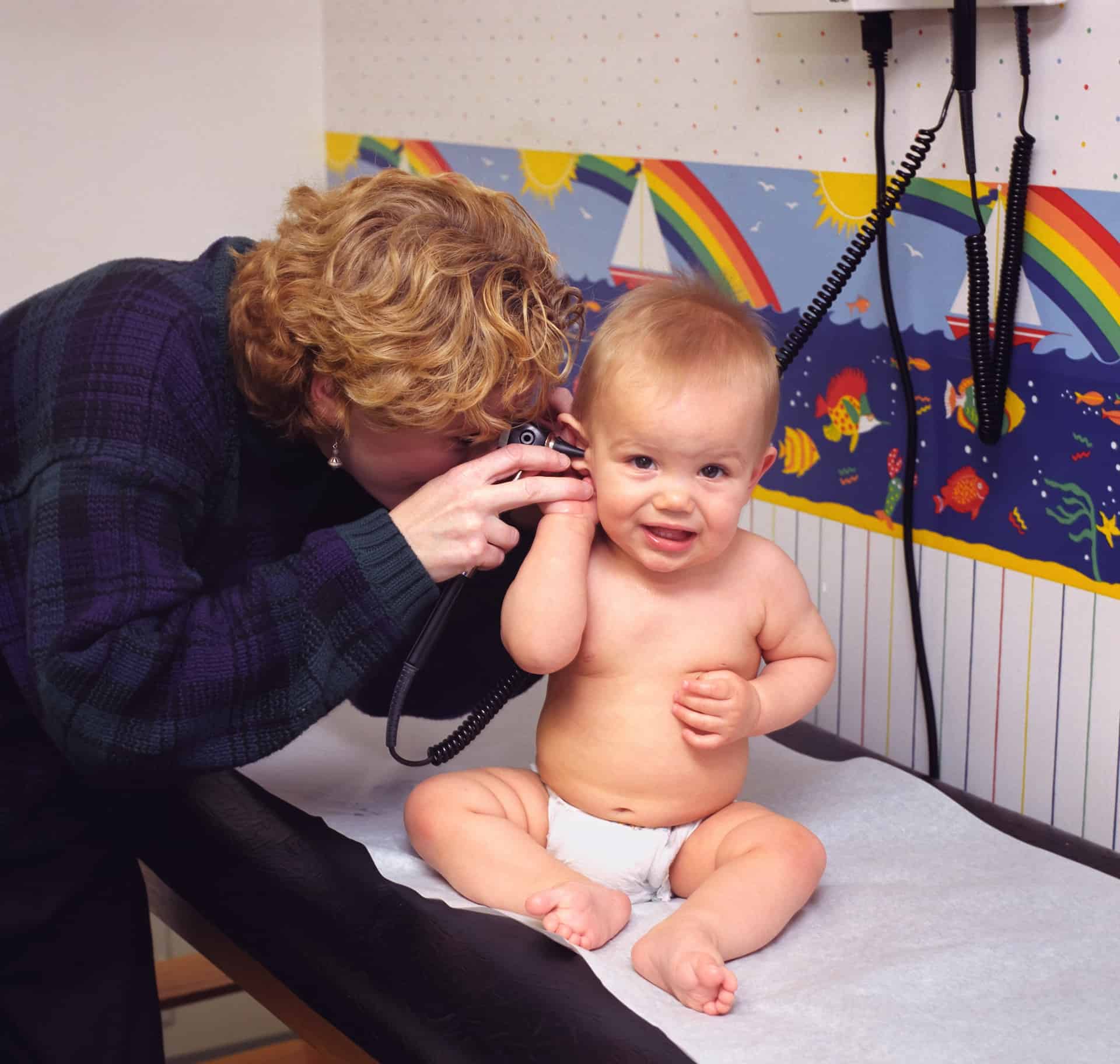 Pediatrician with baby