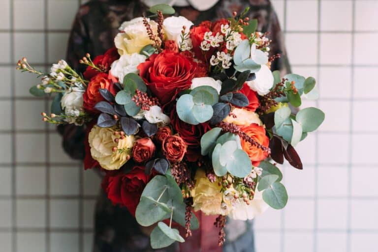 woman holding flower bouquet