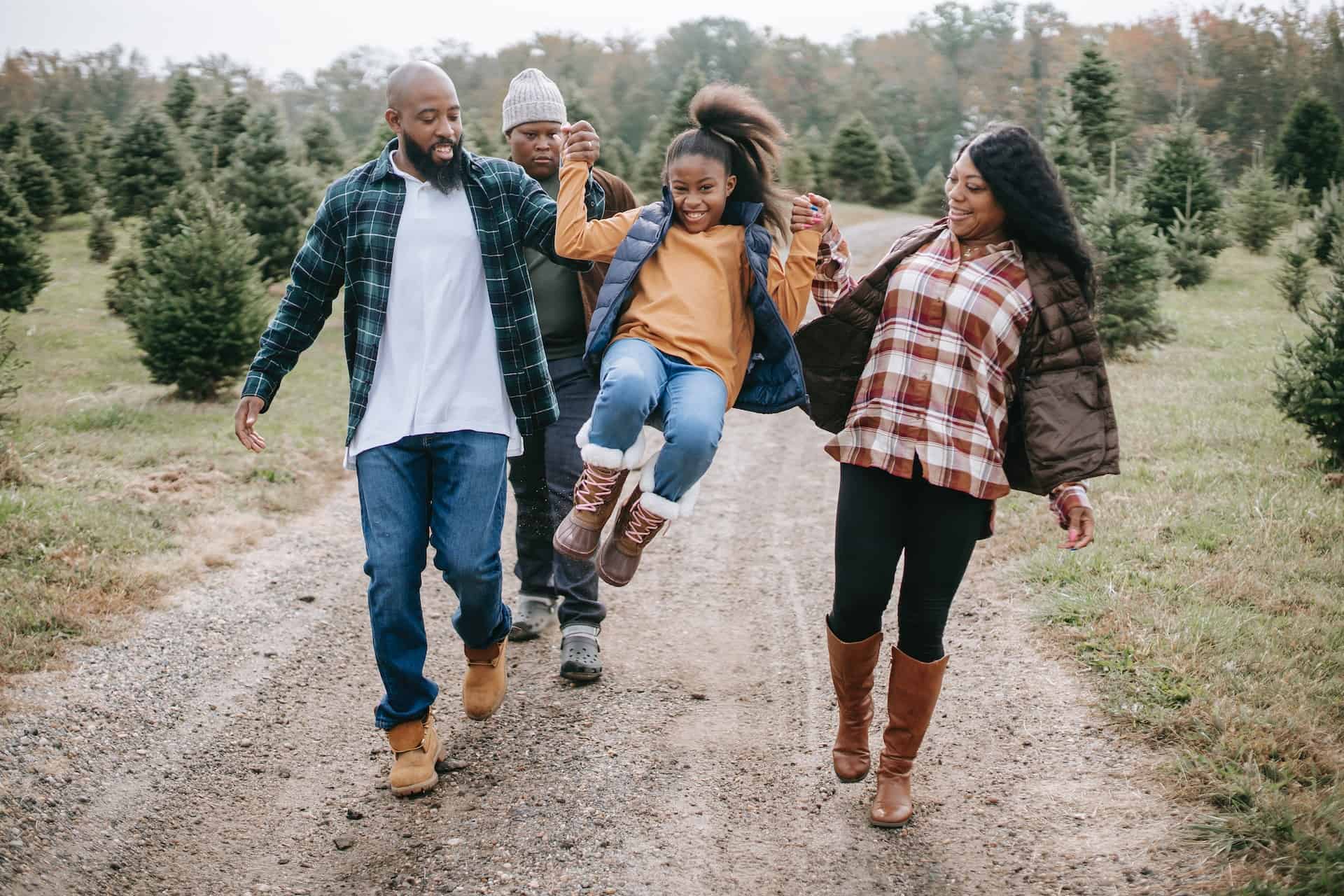 family members outdoors walking