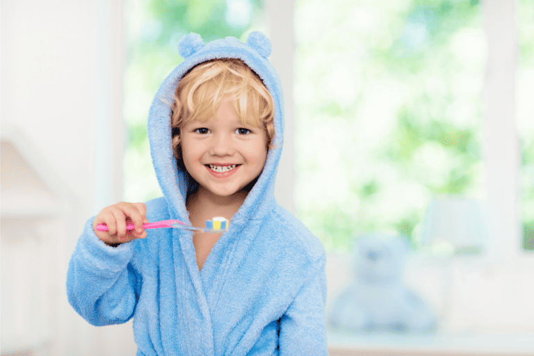 Kid brushing teeth