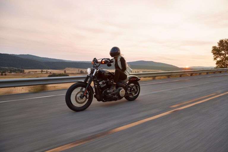 woman riding a Harley Davidson motorcycle