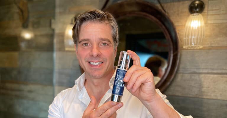 particle face cream man smiling