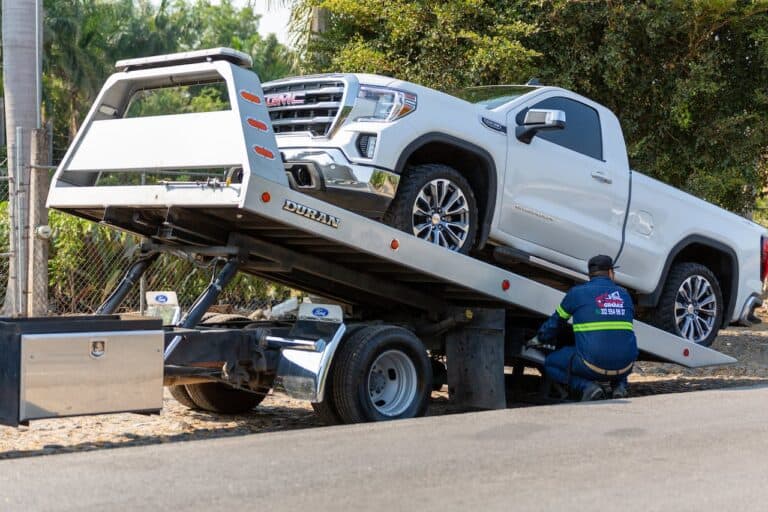tow truck moving gmc truck