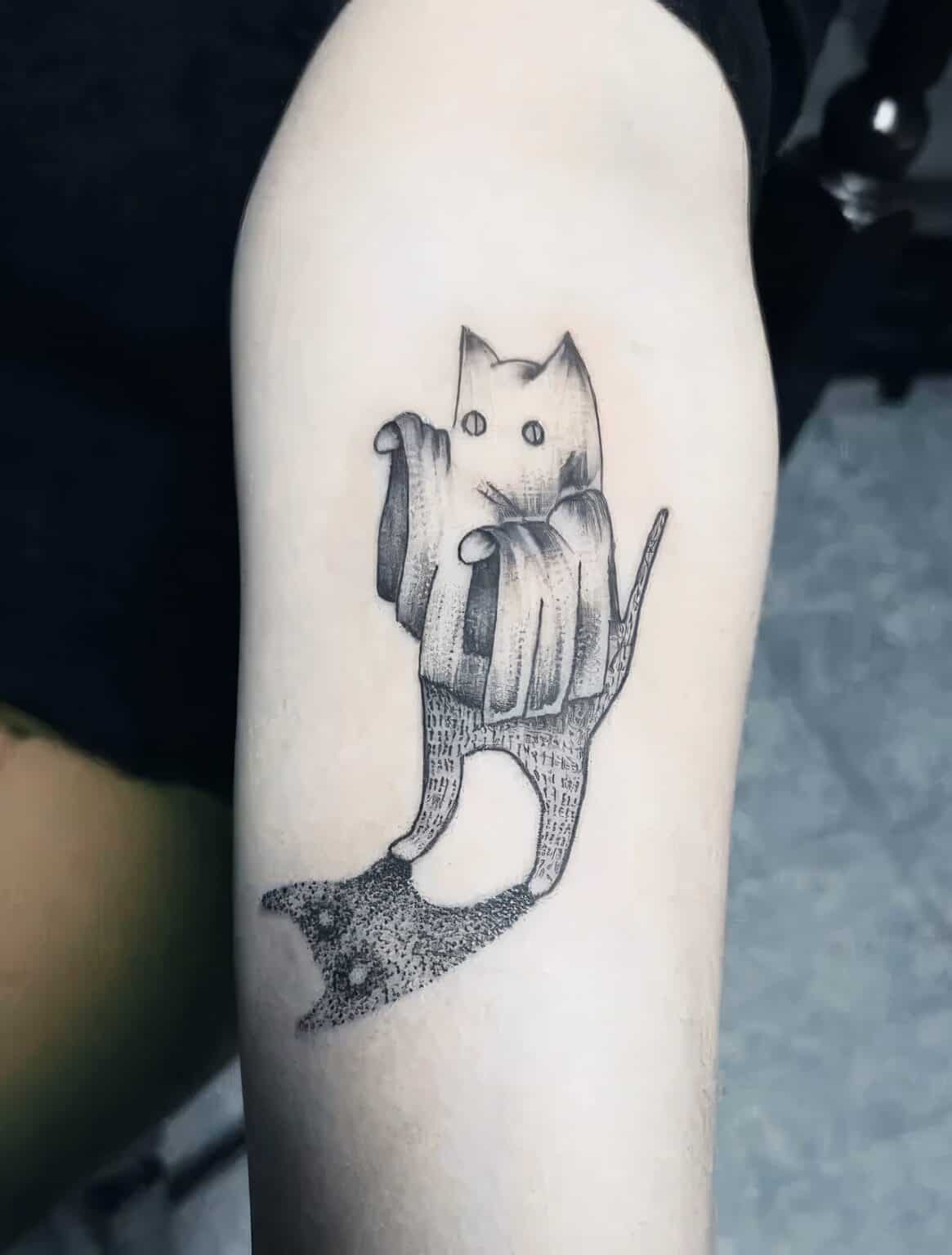Feminine cat tattoos