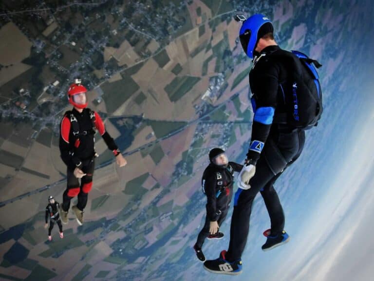 3 men sky diving