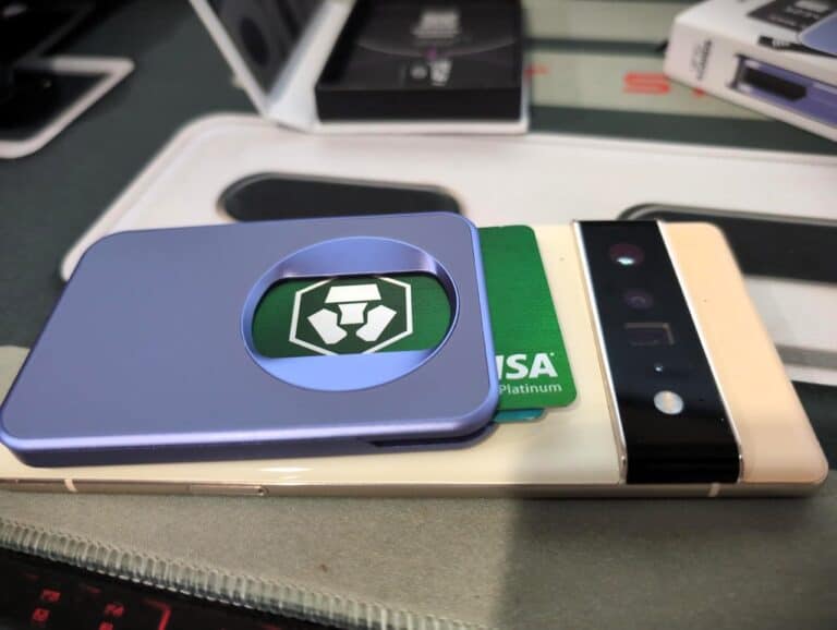 META_Filename: wireless-charging-smartphone-with-credit-card-and-recycling-coin.