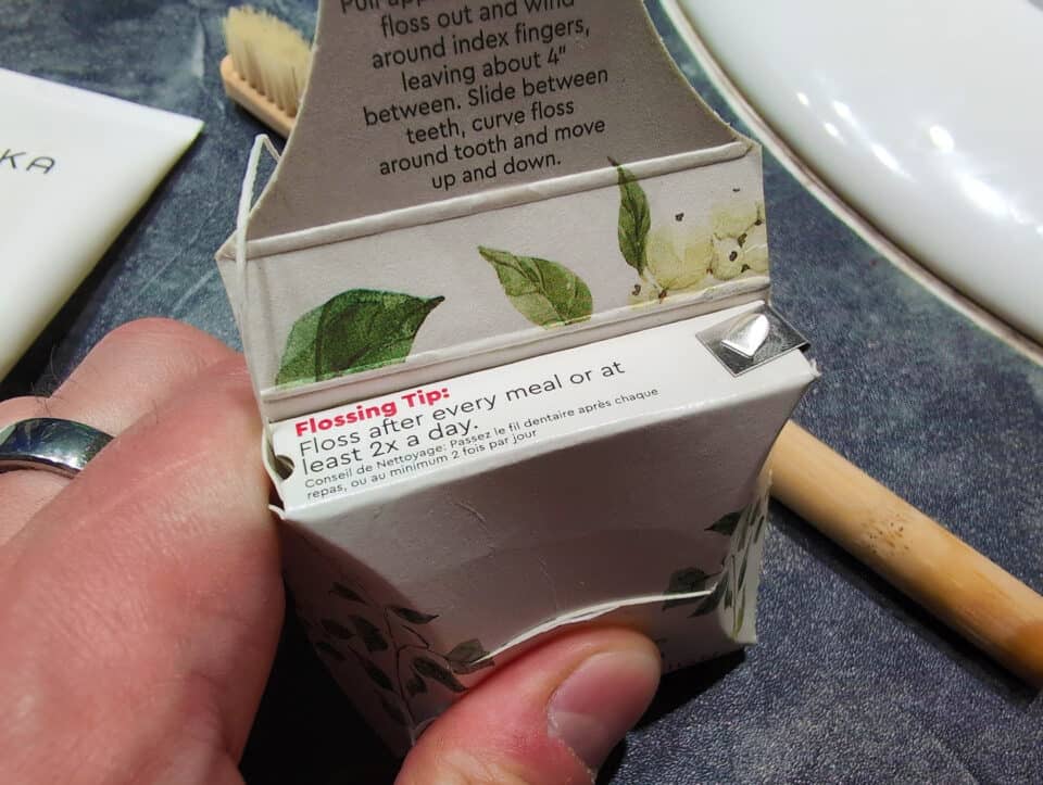 RADIUS Silk Floss Review: 5 Pros, 3 Cons & Eco-Friendly Truth 4 Floss box with leaf pattern, dental floss for oral hygiene, tips on flossing after meals, eco-friendly dental care products, dental health essentials for a bright smile.