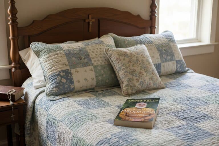 Cozy bedroom with quilted bedding and vintage pillows, natural light from the window, relaxing home decor, and a Christian cross on the headboard, perfect for peaceful retreat or relaxation.