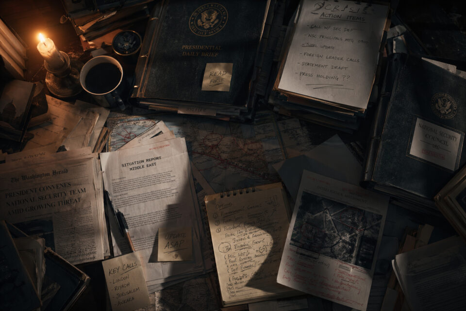 A cluttered desk filled with secret documents, reports, and files, illuminated by a small lamp, creating a mysterious and investigative atmosphere.