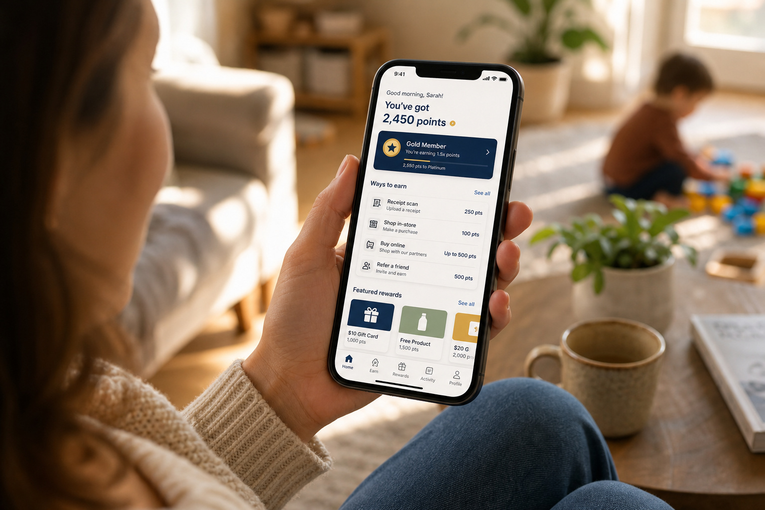 How to Download the KashKick App: Essential Tracking Setup 1 Woman holding smartphone displaying a rewards app with points and offers in a cozy living room setting.