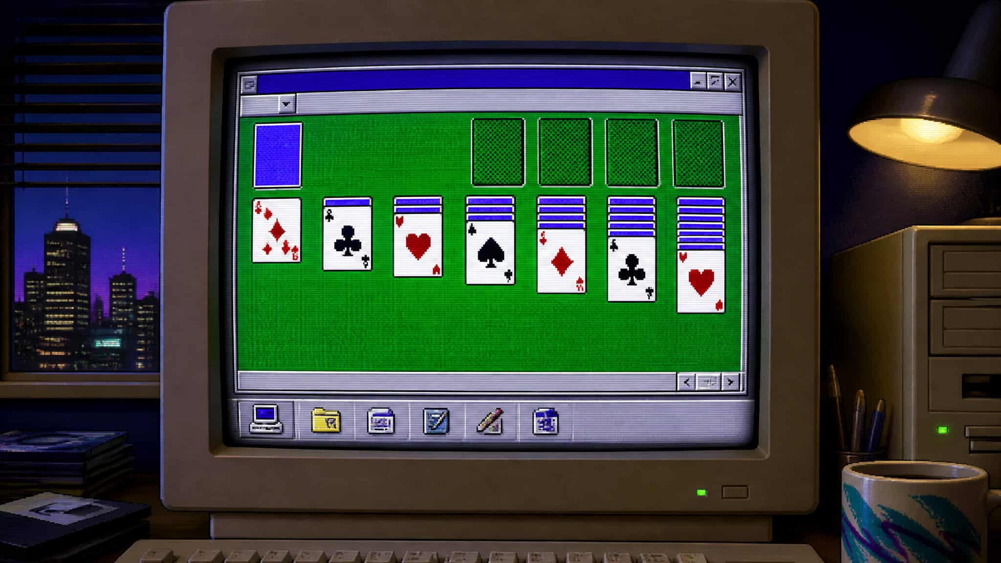Vintage computer screen displaying a game of Solitaire with colorful playing cards and a green background, set in a dimly lit room with cityscape view.